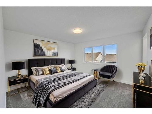 305 Baneberry Way Sw, Airdrie, AB - Indoor Photo Showing Bedroom