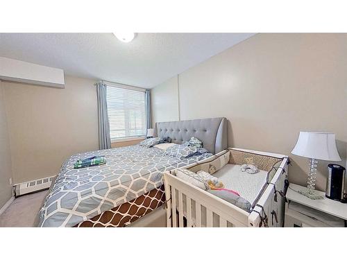 307-103 10 Avenue Nw, Calgary, AB - Indoor Photo Showing Bedroom