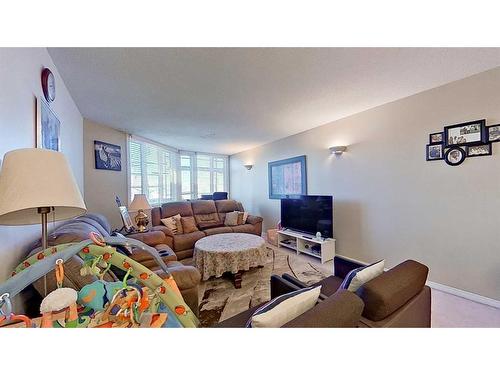 307-103 10 Avenue Nw, Calgary, AB - Indoor Photo Showing Living Room