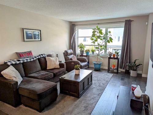 343 Covecreek Circle Ne, Calgary, AB - Indoor Photo Showing Living Room