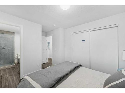 8211 4A Street Sw, Calgary, AB - Indoor Photo Showing Bedroom