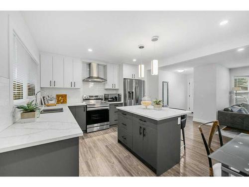 8211 4A Street Sw, Calgary, AB - Indoor Photo Showing Kitchen With Upgraded Kitchen