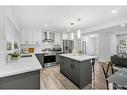 8211 4A Street Sw, Calgary, AB  - Indoor Photo Showing Kitchen With Upgraded Kitchen 