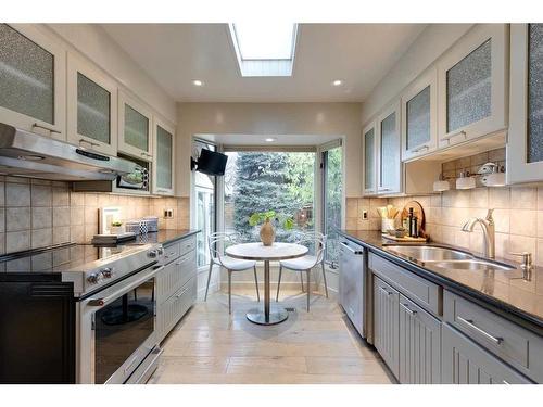 4310 Stanley Drive Sw, Calgary, AB - Indoor Photo Showing Kitchen With Double Sink With Upgraded Kitchen