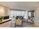 4310 Stanley Drive Sw, Calgary, AB  - Indoor Photo Showing Living Room With Fireplace 