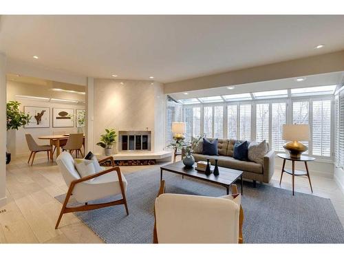 4310 Stanley Drive Sw, Calgary, AB - Indoor Photo Showing Living Room With Fireplace