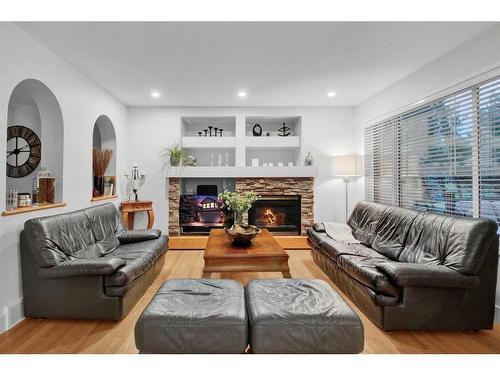 18566 Chaparral Manor Se, Calgary, AB - Indoor Photo Showing Living Room With Fireplace