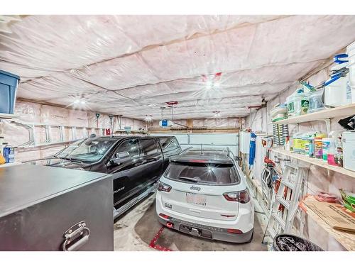 60 Brightondale Close Se, Calgary, AB - Indoor Photo Showing Garage