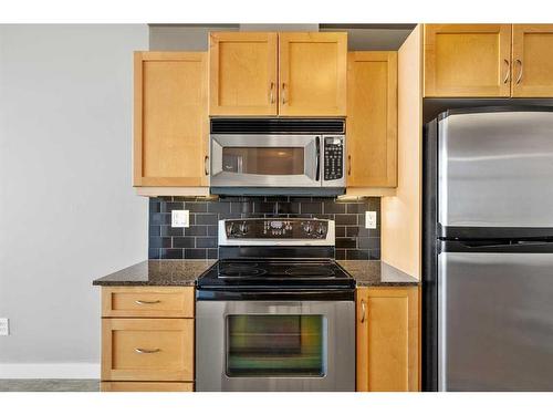 6310-11811 Lake Fraser Drive Se, Calgary, AB - Indoor Photo Showing Kitchen With Stainless Steel Kitchen