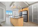 6310-11811 Lake Fraser Drive Se, Calgary, AB  - Indoor Photo Showing Kitchen With Stainless Steel Kitchen 