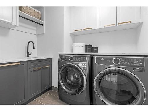 340 West Chestermere Drive, Chestermere, AB - Indoor Photo Showing Laundry Room