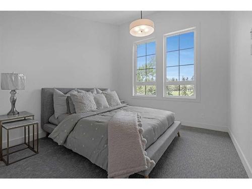 340 West Chestermere Drive, Chestermere, AB - Indoor Photo Showing Bedroom