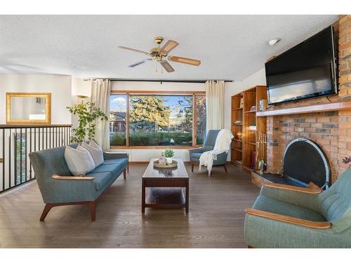 40 Thornaby Crescent Nw, Calgary, AB - Indoor Photo Showing Living Room With Fireplace