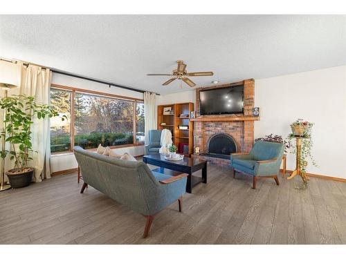 40 Thornaby Crescent Nw, Calgary, AB - Indoor Photo Showing Living Room With Fireplace