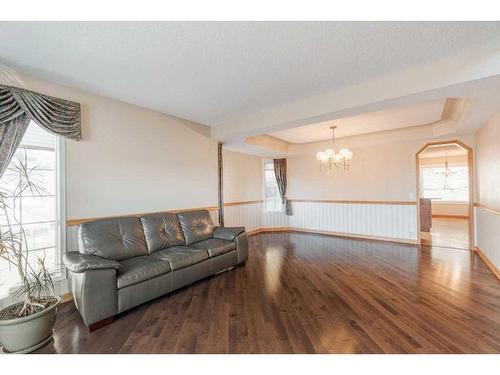 348 Sienna Park Drive Sw, Calgary, AB - Indoor Photo Showing Living Room