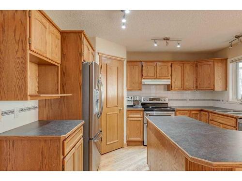 348 Sienna Park Drive Sw, Calgary, AB - Indoor Photo Showing Kitchen With Stainless Steel Kitchen