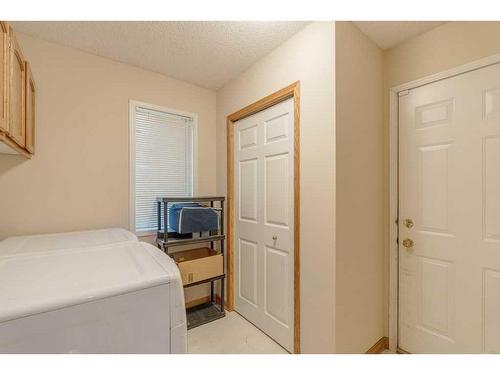 348 Sienna Park Drive Sw, Calgary, AB - Indoor Photo Showing Laundry Room