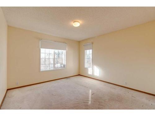 348 Sienna Park Drive Sw, Calgary, AB - Indoor Photo Showing Other Room