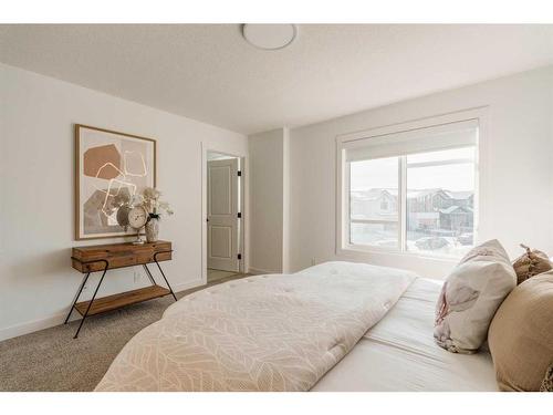 8 Royston Walk Nw, Calgary, AB - Indoor Photo Showing Bedroom