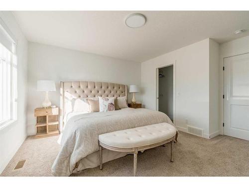 8 Royston Walk Nw, Calgary, AB - Indoor Photo Showing Bedroom