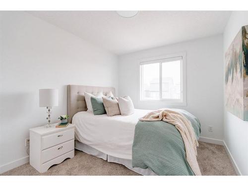 8 Royston Walk Nw, Calgary, AB - Indoor Photo Showing Bedroom