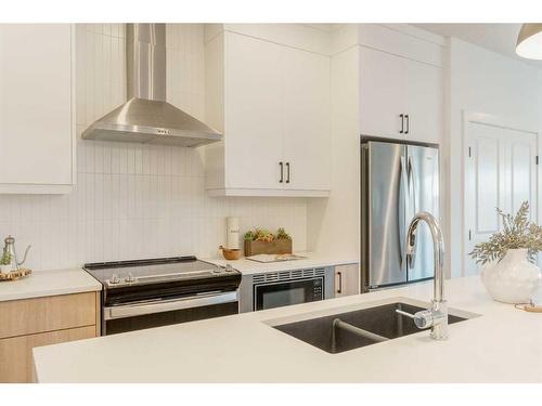 8 Royston Walk Nw, Calgary, AB - Indoor Photo Showing Kitchen With Double Sink With Upgraded Kitchen