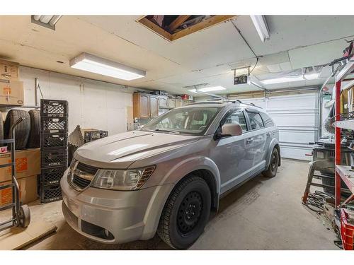 160 Havenhurst Crescent Sw, Calgary, AB - Indoor Photo Showing Garage