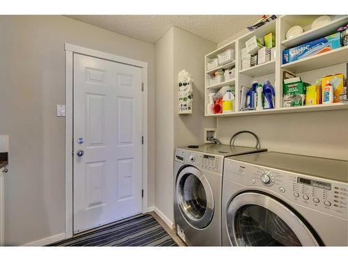 145 Arbour Crest Heights Nw, Calgary, AB - Indoor Photo Showing Laundry Room