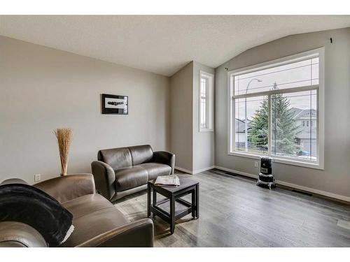 145 Arbour Crest Heights Nw, Calgary, AB - Indoor Photo Showing Living Room