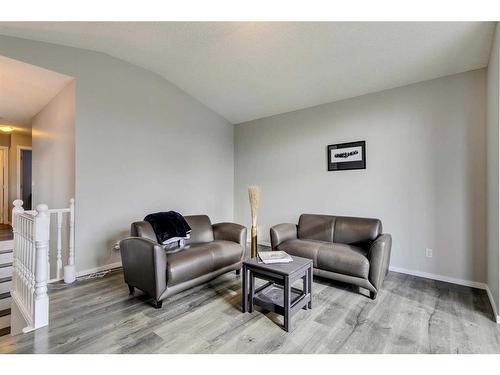 145 Arbour Crest Heights Nw, Calgary, AB - Indoor Photo Showing Living Room