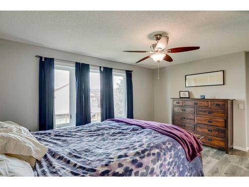 145 Arbour Crest Heights Nw, Calgary, AB - Indoor Photo Showing Bedroom