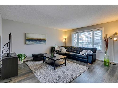 145 Arbour Crest Heights Nw, Calgary, AB - Indoor Photo Showing Living Room