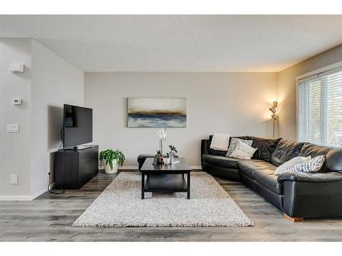 145 Arbour Crest Heights Nw, Calgary, AB - Indoor Photo Showing Living Room