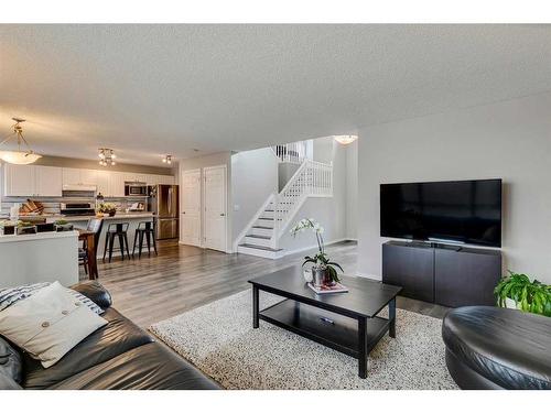 145 Arbour Crest Heights Nw, Calgary, AB - Indoor Photo Showing Living Room