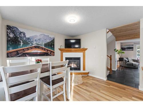 107 Tuffy'S Haven, Strathmore, AB - Indoor With Fireplace