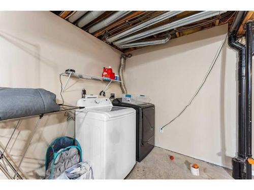 107 Tuffy'S Haven, Strathmore, AB - Indoor Photo Showing Laundry Room