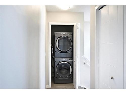 110 Nolan Hill Heights Nw, Calgary, AB - Indoor Photo Showing Laundry Room