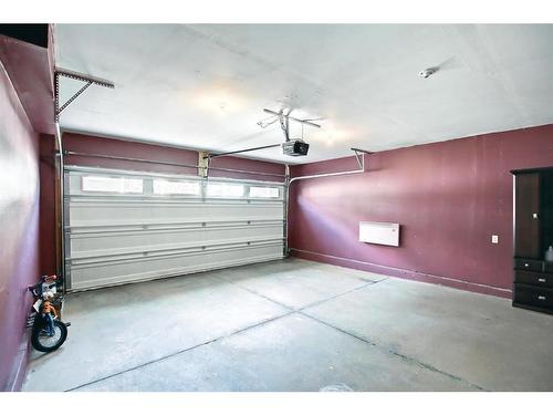 110 Nolan Hill Heights Nw, Calgary, AB - Indoor Photo Showing Garage