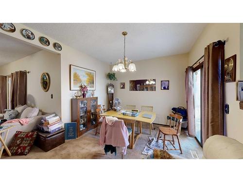 103 Slade Drive, Nanton, AB - Indoor Photo Showing Dining Room