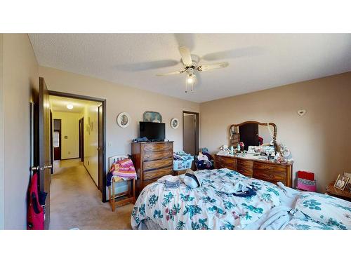 103 Slade Drive, Nanton, AB - Indoor Photo Showing Bedroom