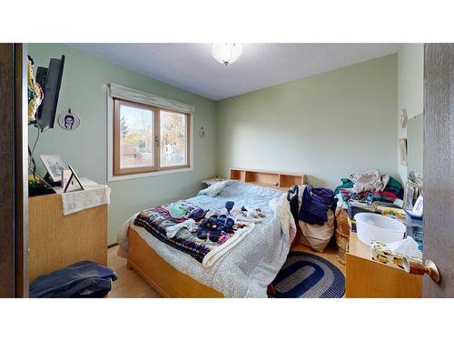 103 Slade Drive, Nanton, AB - Indoor Photo Showing Bedroom