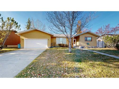 103 Slade Drive, Nanton, AB - Outdoor With Facade