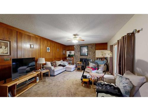 103 Slade Drive, Nanton, AB - Indoor Photo Showing Living Room