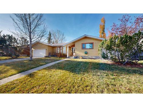 103 Slade Drive, Nanton, AB - Outdoor With Facade