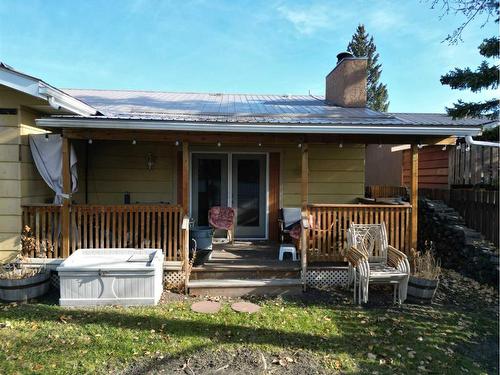 103 Slade Drive, Nanton, AB - Outdoor With Deck Patio Veranda