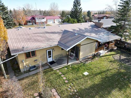 103 Slade Drive, Nanton, AB - Outdoor With Deck Patio Veranda