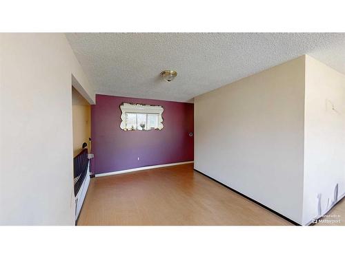 103 Slade Drive, Nanton, AB - Indoor Photo Showing Other Room