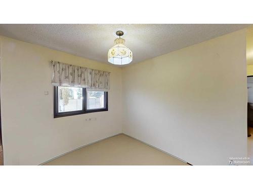 103 Slade Drive, Nanton, AB - Indoor Photo Showing Other Room