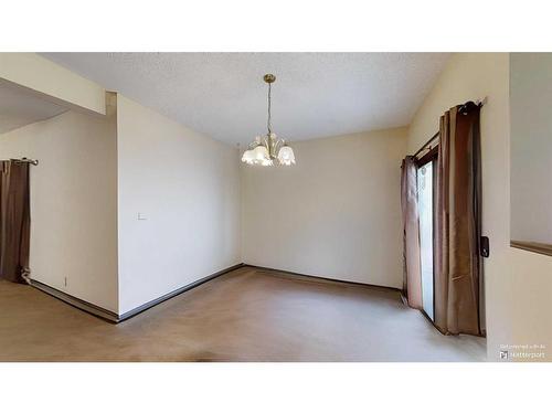 103 Slade Drive, Nanton, AB - Indoor Photo Showing Other Room