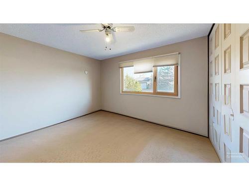 103 Slade Drive, Nanton, AB - Indoor Photo Showing Other Room